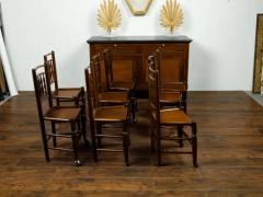 Set of Eight English 1880s Oak Dining Room Side Chairs with Spindle Motifs - 3596058