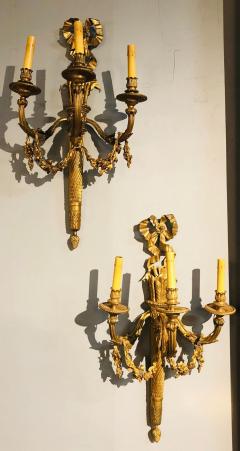 Set of Four Large Ornate Three Light Torch and Ribbon Form Wall Sconces - 2938936