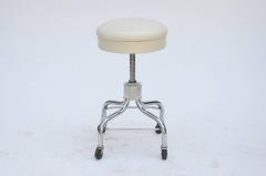 Set of Four Vintage Chrome and White Leather Adjustable Rolling Stools - 974279