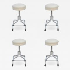 Set of Four Vintage Chrome and White Leather Adjustable Rolling Stools - 974374