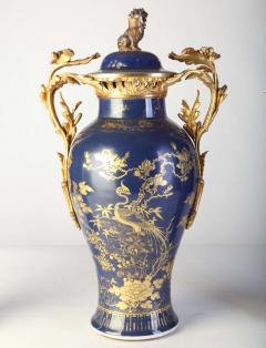 Set of Three 18th century Chinese Powder Blue Gilt Decorated Vases - 2706279