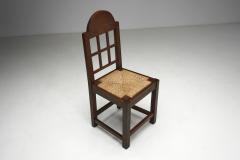 Set of Twelve Oak and Straw Dining Chairs with Geometric Backs Spain ca 1930s - 4477176