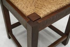 Set of Twelve Oak and Straw Dining Chairs with Geometric Backs Spain ca 1930s - 4477182