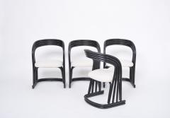 Set of four reupholstered dining chairs in organically formed black rattan - 2969495