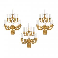 Set of three Neoclassical gilt bronze wall lights - 4417226