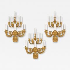 Set of three Neoclassical gilt bronze wall lights - 4419434