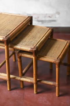 Set of three stackable rattan tables 1980 - 3548352