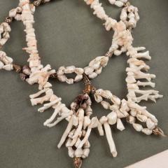 Shell and white branch coral necklaces mounted in a custom shadowbox - 3353377