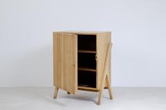 Small storage unit in light oak with ribbed wood front  - 2416133