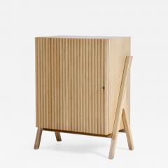 Small storage unit in light oak with ribbed wood front  - 2418276