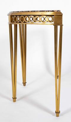 Striking Pair of Bronze Consoles with Fossilized Marble Tops - 4329428