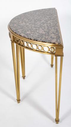 Striking Pair of Bronze Consoles with Fossilized Marble Tops - 4329431