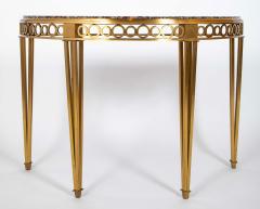 Striking Pair of Bronze Consoles with Fossilized Marble Tops - 4329434