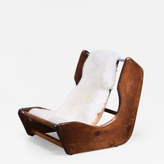Studio craft leather sling lounge chair with sheepskin USA 1950s - 2360813