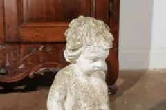 Swedish Carved Stone Garden Sculpture of a Putto Sitting on a Rock 20th Century - 3450952