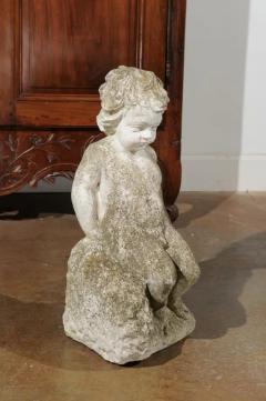 Swedish Carved Stone Garden Sculpture of a Putto Sitting on a Rock 20th Century - 3450965