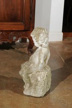 Swedish Carved Stone Garden Sculpture of a Putto Sitting on a Rock 20th Century - 3451123