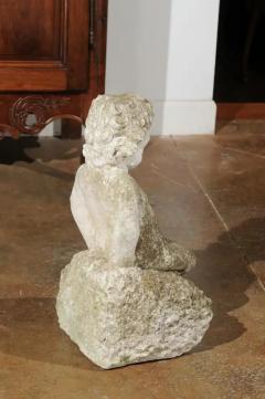 Swedish Carved Stone Garden Sculpture of a Putto Sitting on a Rock 20th Century - 3451132