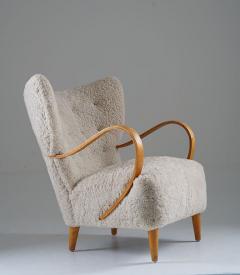 Swedish Midcentury Wingback Lounge Chair in Sheepskin - 3102646
