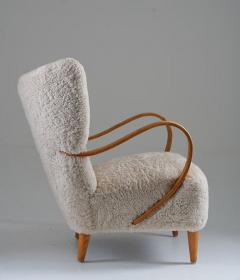 Swedish Midcentury Wingback Lounge Chair in Sheepskin - 3102651