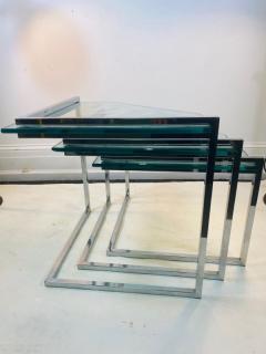 TRIO OF MODERN CHROME AND GLASS NESTING TABLES - 1557281