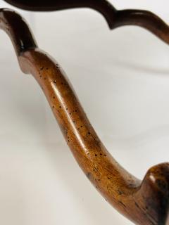 The leather shows wear and signs of repair  - 3235778