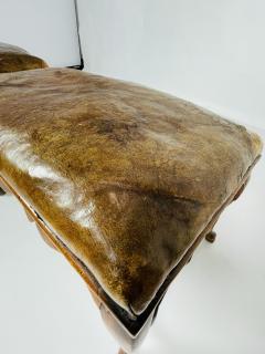 The leather shows wear and signs of repair  - 3235782