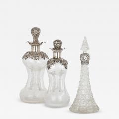 Three English sterling silver and cut glass bottles - 3251630