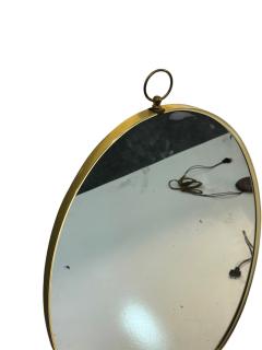 Tommi Parzinger MID CENTURY BRASS FRAMED OVAL MIRROR WITH RING IN THE MANNER OF TOMMI PARZINGER - 4695554