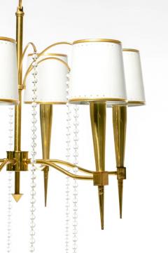 Tommi Parzinger Tommi Parzinger Hollywood Regency Chandelier of Flowing Crystals and Brass - 3080058