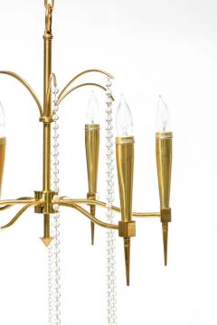 Tommi Parzinger Tommi Parzinger Hollywood Regency Chandelier of Flowing Crystals and Brass - 3080060