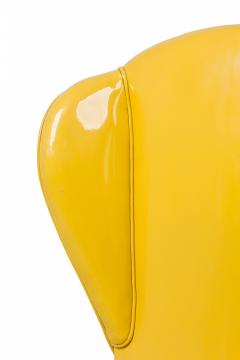 Tommi Parzinger Tommi Parzinger Mid Century American Yellow Vinyl Upholstered Wing Chair - 4274956