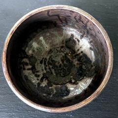 Toshiko Takaezu Ceramic Tea Bowl with Black Iridescent Glaze by Toshiko Takaezu - 2530651