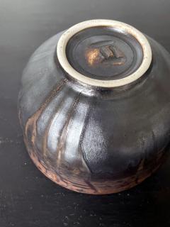 Toshiko Takaezu Ceramic Tea Bowl with Black Iridescent Glaze by Toshiko Takaezu - 2530656