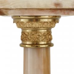 Two French white onyx and gilt bronze column shaped stands - 1503083