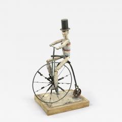 UNCLE SAM ON A HIGH WHEEL BICYCLE WHIRLIGIG - 3562816