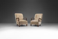 Upholstered Lounge Chairs with Sculptural Arms Europe ca 1940s - 3090194