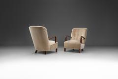 Upholstered Lounge Chairs with Sculptural Arms Europe ca 1940s - 3090195
