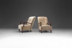 Upholstered Lounge Chairs with Sculptural Arms Europe ca 1940s - 3090197