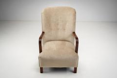 Upholstered Lounge Chairs with Sculptural Arms Europe ca 1940s - 3090198