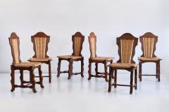 Victor Courtray Set of Six Victor Courtray Attributed Dining Chairs in Oak and Rush 1950s - 2047075