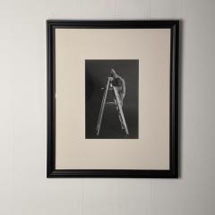 Vintage Art Photograph of a Man on a Ladder - 1531848