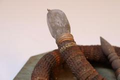 Vintage Folk Art Hand Carved Wood and Bottlecap Snake on Octagonal Base - 3934319