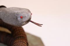 Vintage Folk Art Hand Carved Wood and Bottlecap Snake on Octagonal Base - 3934321