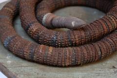 Vintage Folk Art Hand Carved Wood and Bottlecap Snake on Octagonal Base - 3934323