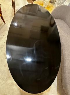 Vintage Italian Oval Ebonized Dining Table resting on a Bronze Base - 4512417