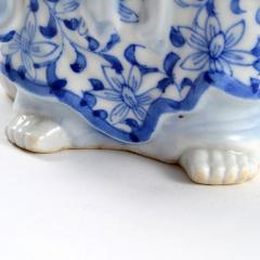 Vintage Porcelain Buddha Holding a Fan - 151151