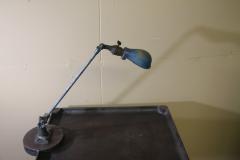 Vintage metal industrial work table with OC white lamp attached - 3390518