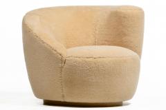 Vladimir Kagan Vladimir Kagan Nautilus Swivel Lounge Chair Ottoman in Butterscotch Shearling - 4333639