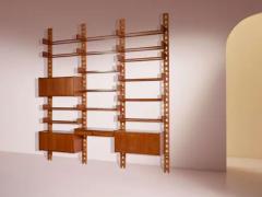 Wall mounted bookcase with wooden uprights and modules Italy 1950s - 3946921